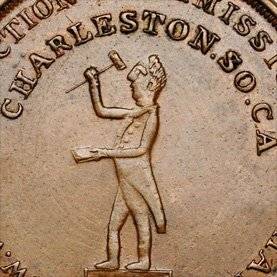 coin with a person holding a gavel